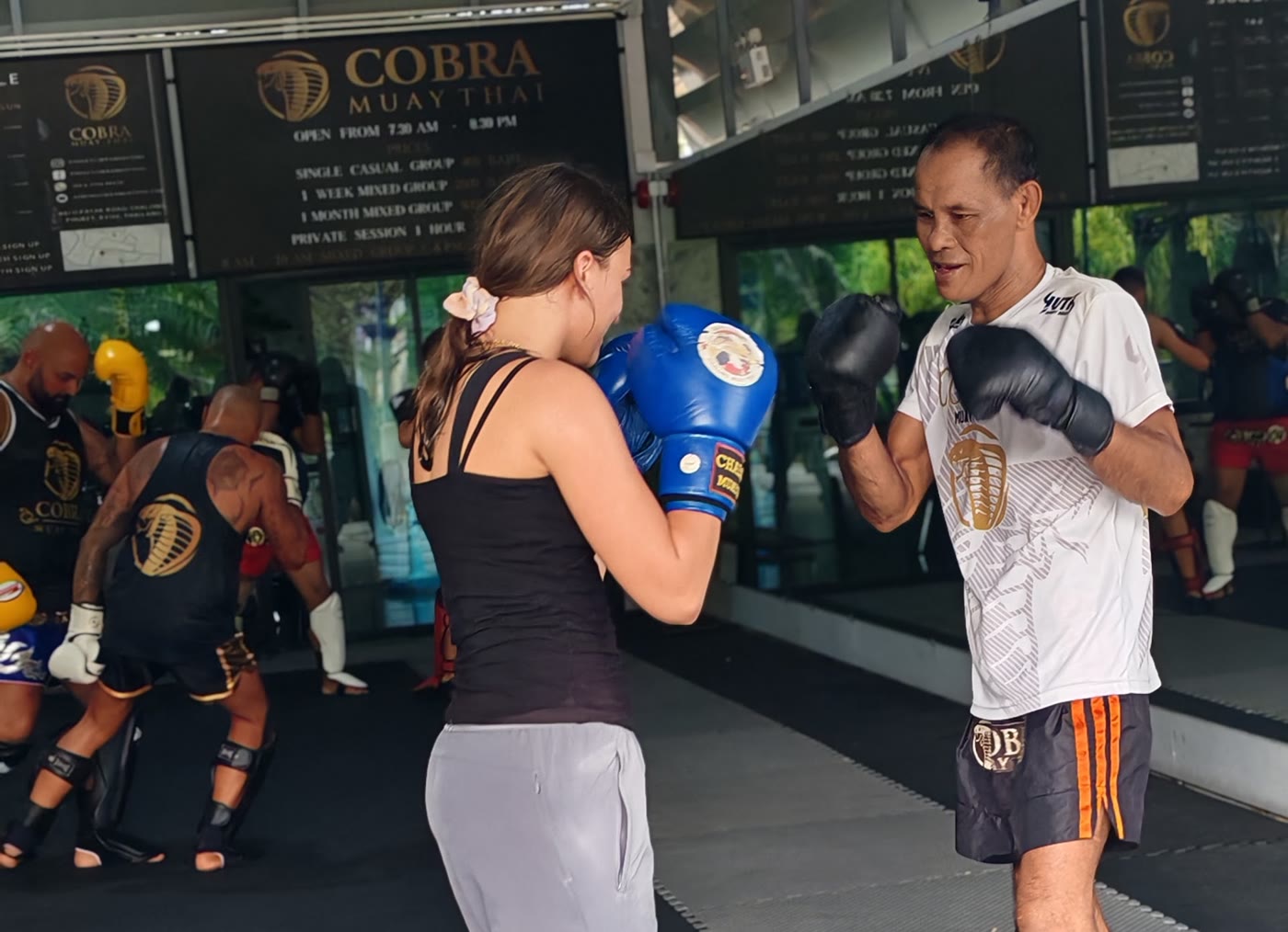 Coach Eyat pad correction at Cobra Muay Thai