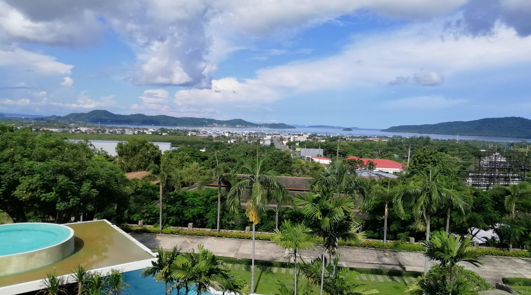 Resort pool and Chalong Bay recovery view